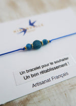 bracelet cordon bleu ajustable en pierres porte-bonheur, petit prix fabrication artisanale. cadeau parfait pour souhaiter un bon rétablissement.