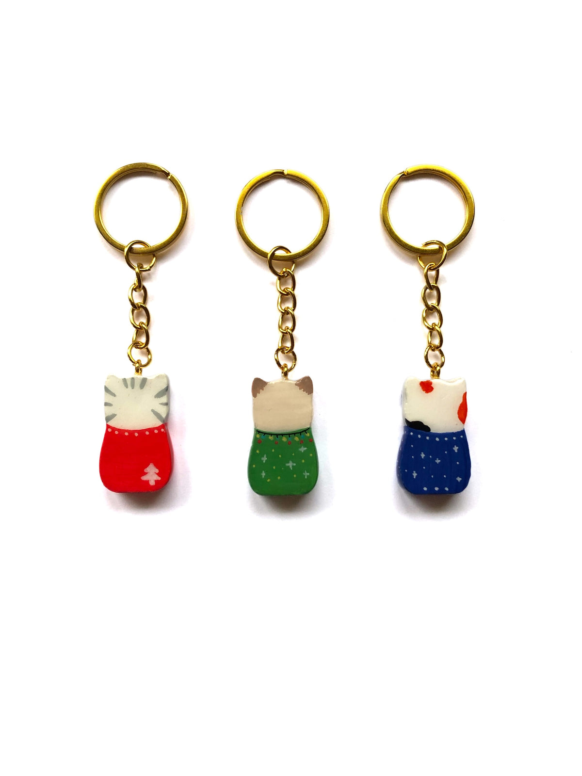 Porte-clés chat en pull de noël, fabrication artisanale, en édition limitée pour Noël.