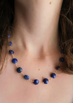 collier porte bonheur lapis lazuli sur cordon