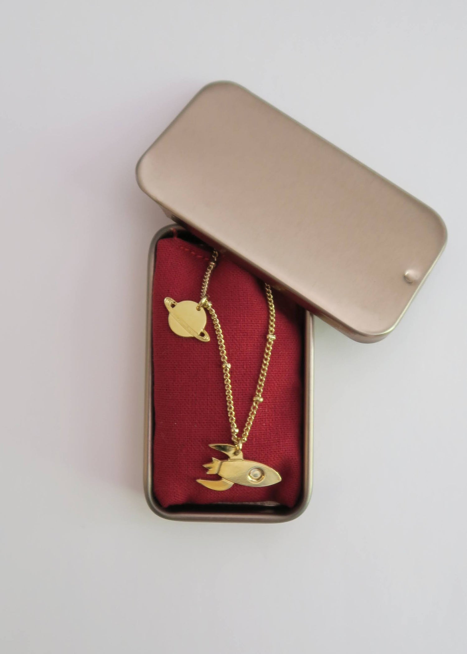 Collier planète et fusée