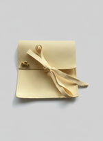 pochette à bijoux en suédine jaune