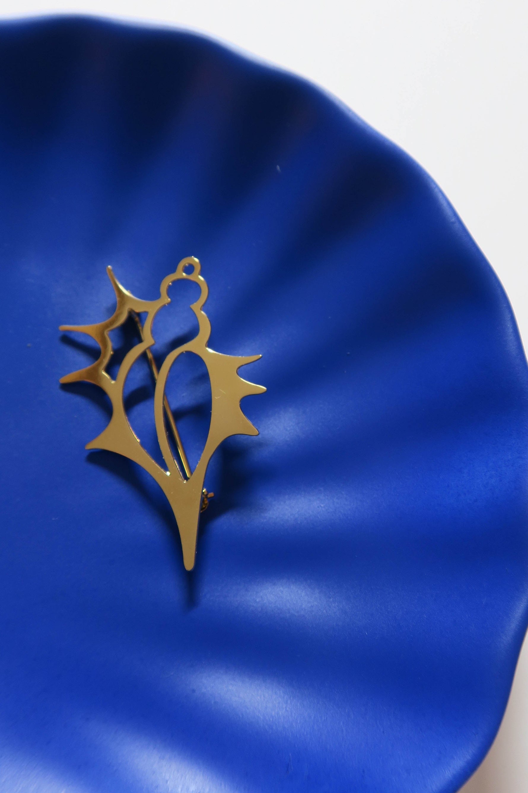 Broche Lambi coquillage dorée - Hirondelle Bijoux